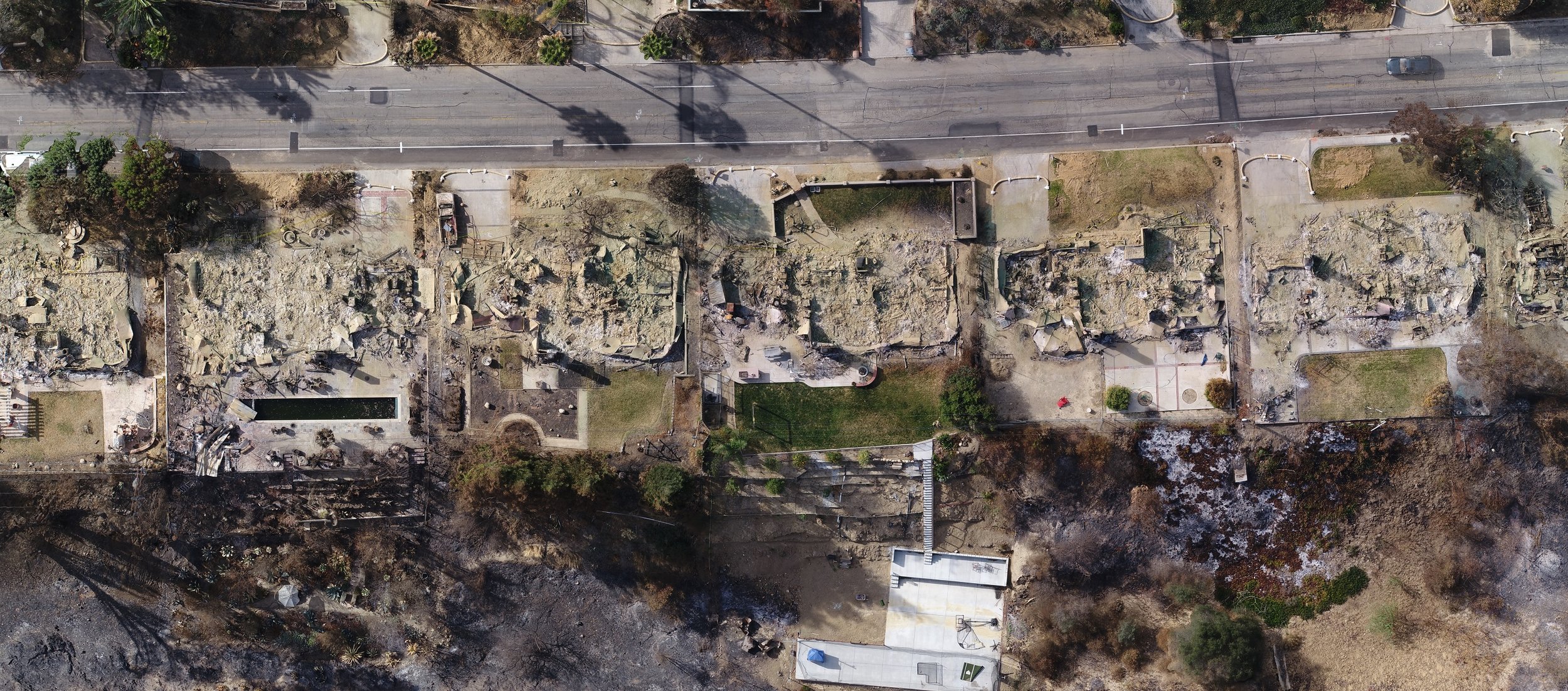 Photo showing houses before the fire - courtesy of Google Earth - and after - courtesy of WM Surveys using the Aerotas Mapping System