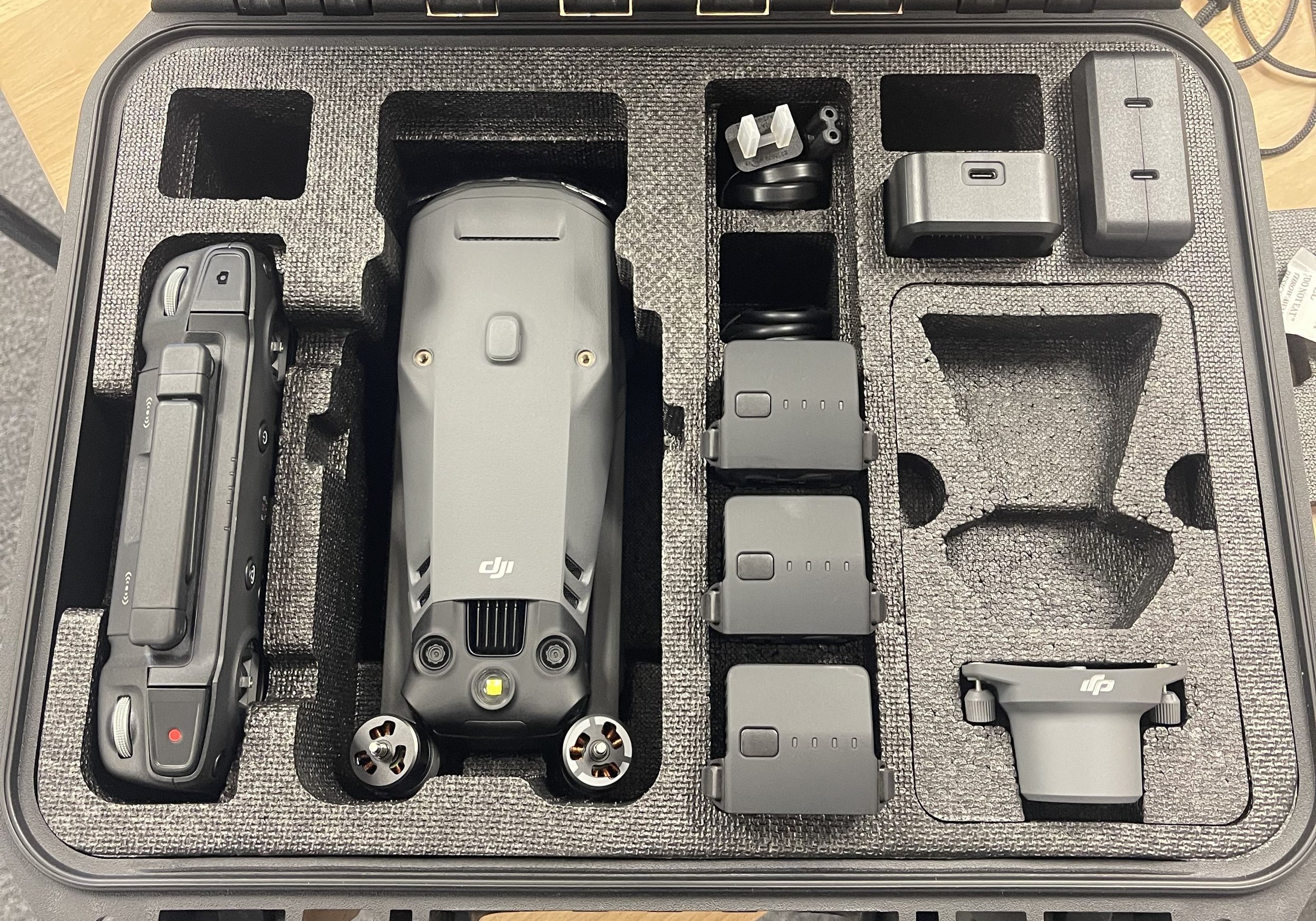 Pictured above are 3 major components of a useful Mavic 3E surveying kit - the Mavic 3E, the RTK Module, and the Battery Kit 