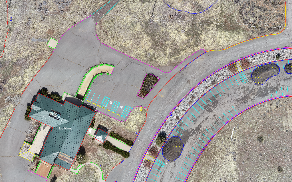 Drafted site map with linework over aerial imagery and marked features.